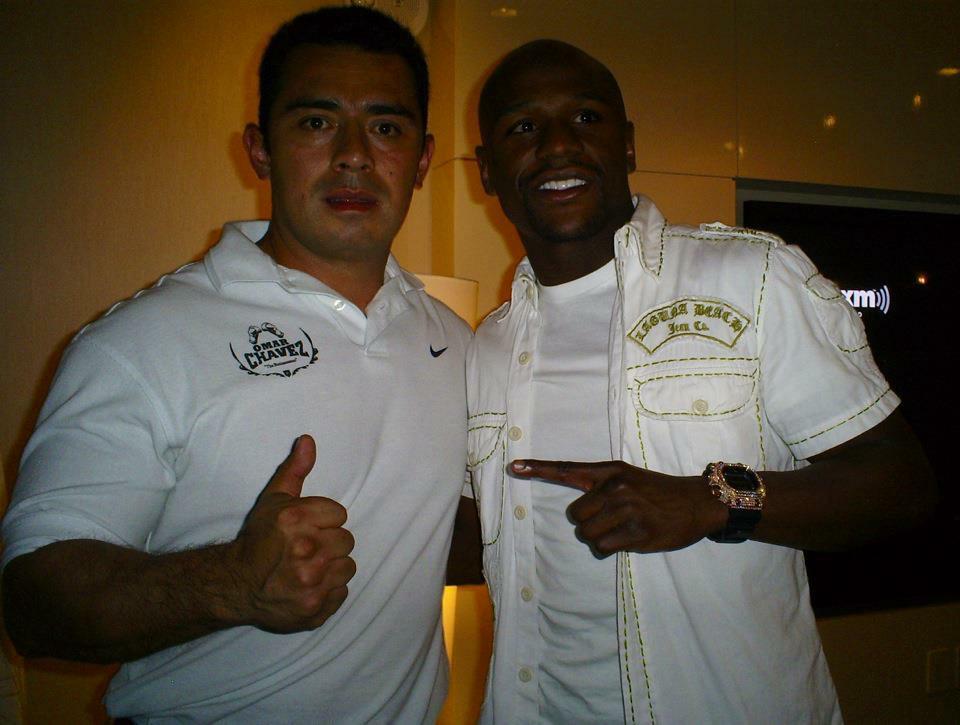 Coach junto a Floyd Mayweather